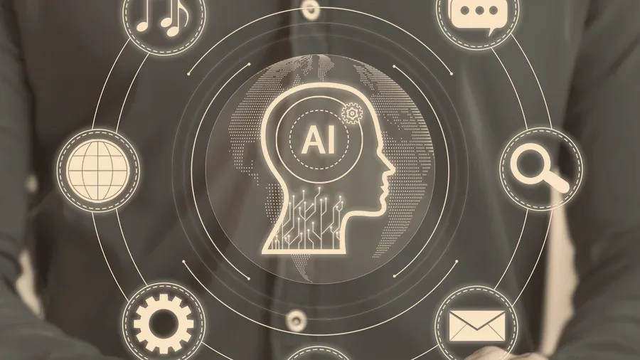 AI and automation icons around a person at a laptop